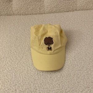Yellow Cap with Afro Graphic